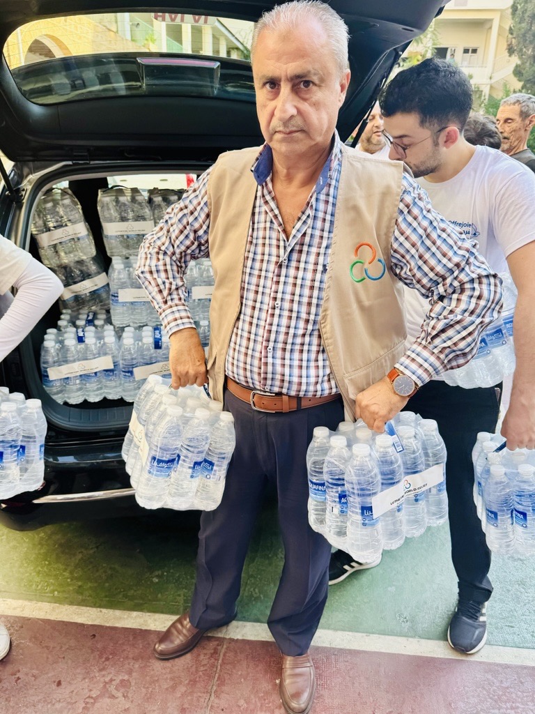 Our staff deliver water to IDPs sheltering in Beirut.
