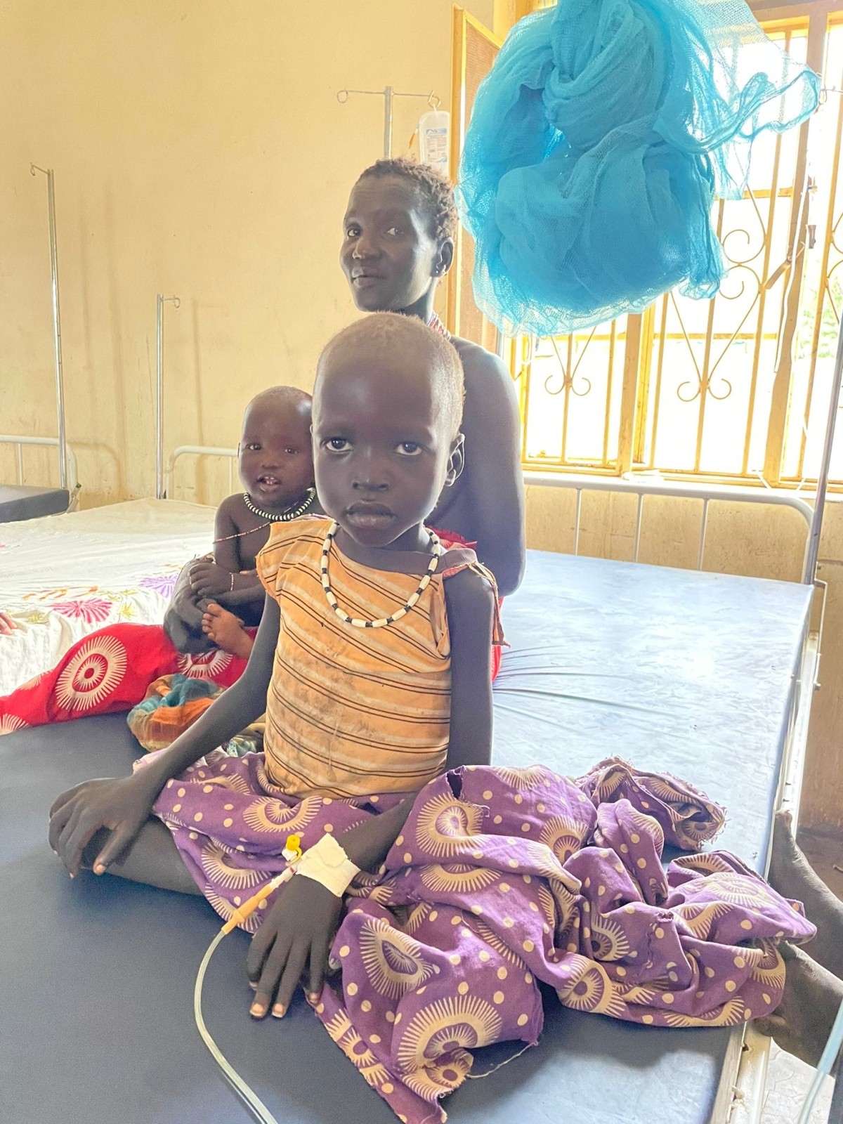 A young VL patient receives lifesaving treatment at an IMA World Health-supported hospital in Kapoeta, South Sudan. 