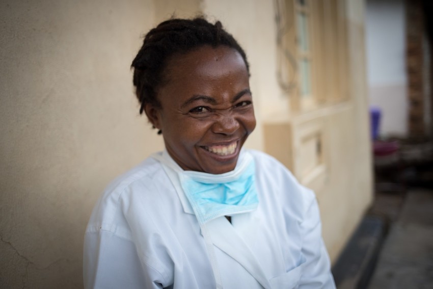 A nurse smiles