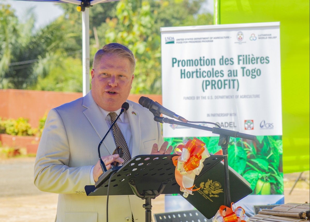 Mr. Ronald Hawkins Jr., Chargé d'Affaires of the United States Embassy in Togo, speaks to the audience at the PROFIT launch event about the benefits of the project.